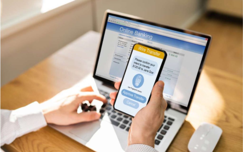 A person checks their credit card application status on a smartphone, highlighting the importance of secure passwords against hackers.